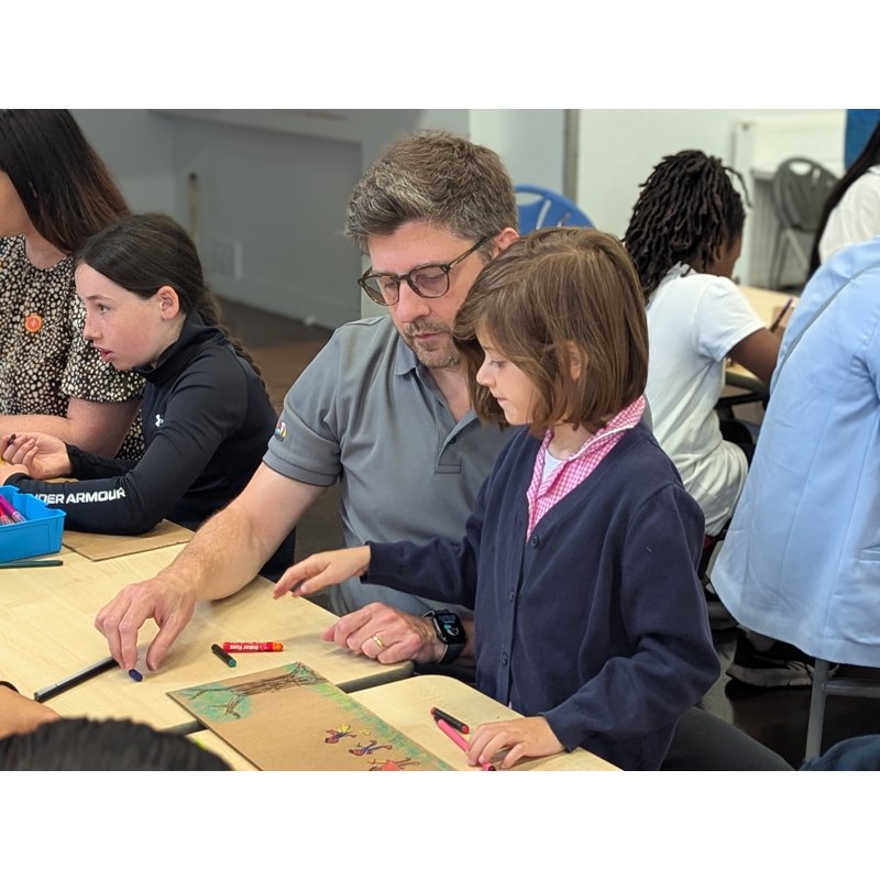 A parent and child making together